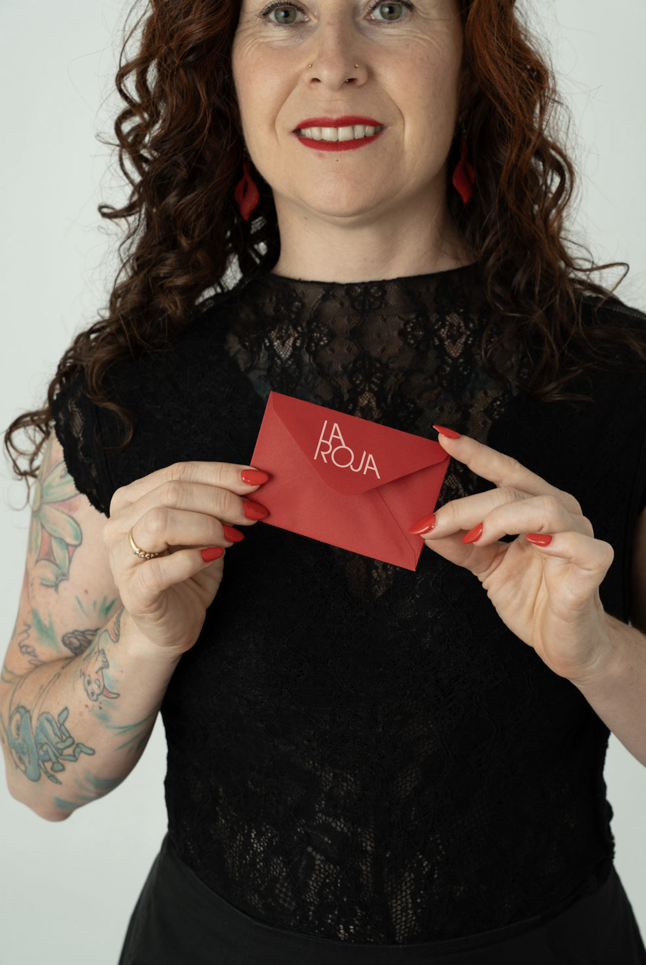 Marina holding red envelope